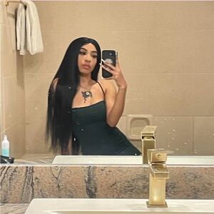 Maxi green dress with a slit